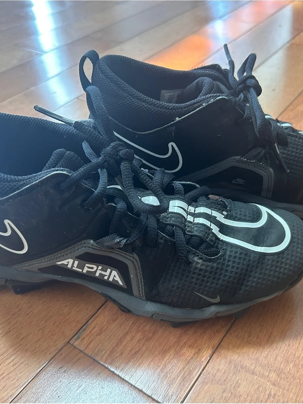 Nike Black football cleats with White Logo size 6